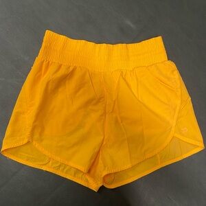 All in Motion bright orangee shorts size small